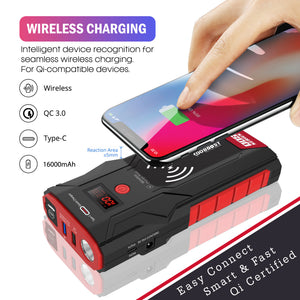 A portable car jump starter power bank with red and black accents, shown with a smartphone placed on top for wireless charging. A human hand is visible touching the phone, and text highlights wireless charging, Qi compatibility, Type-C, and 16000mAh.